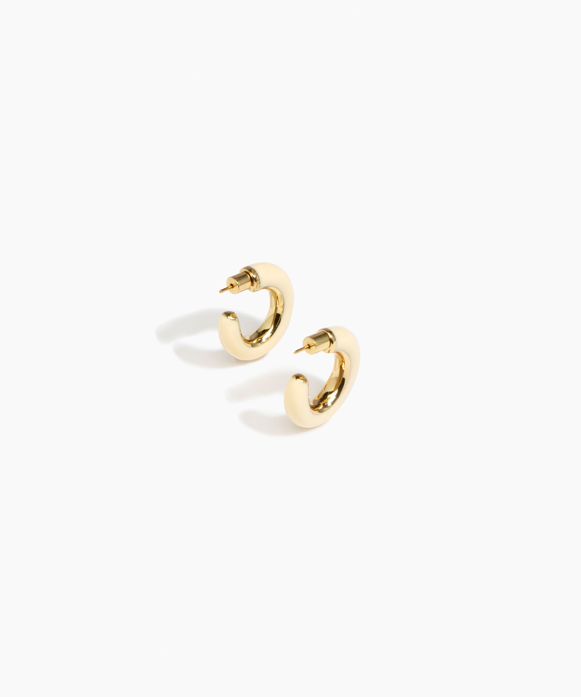 Dinosaur Designs Medium Pebble Duo Hoop Earrings in Cream — cream resin hoop earrings with polished brass inner face and stud fastening