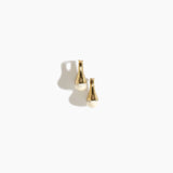 Dinosaur Designs Polished Lotus Hoop Earrings in Chalk Swirl with Brass — marbled cream resin half-dome hoop earrings with polished brass hardware and hinged clasp