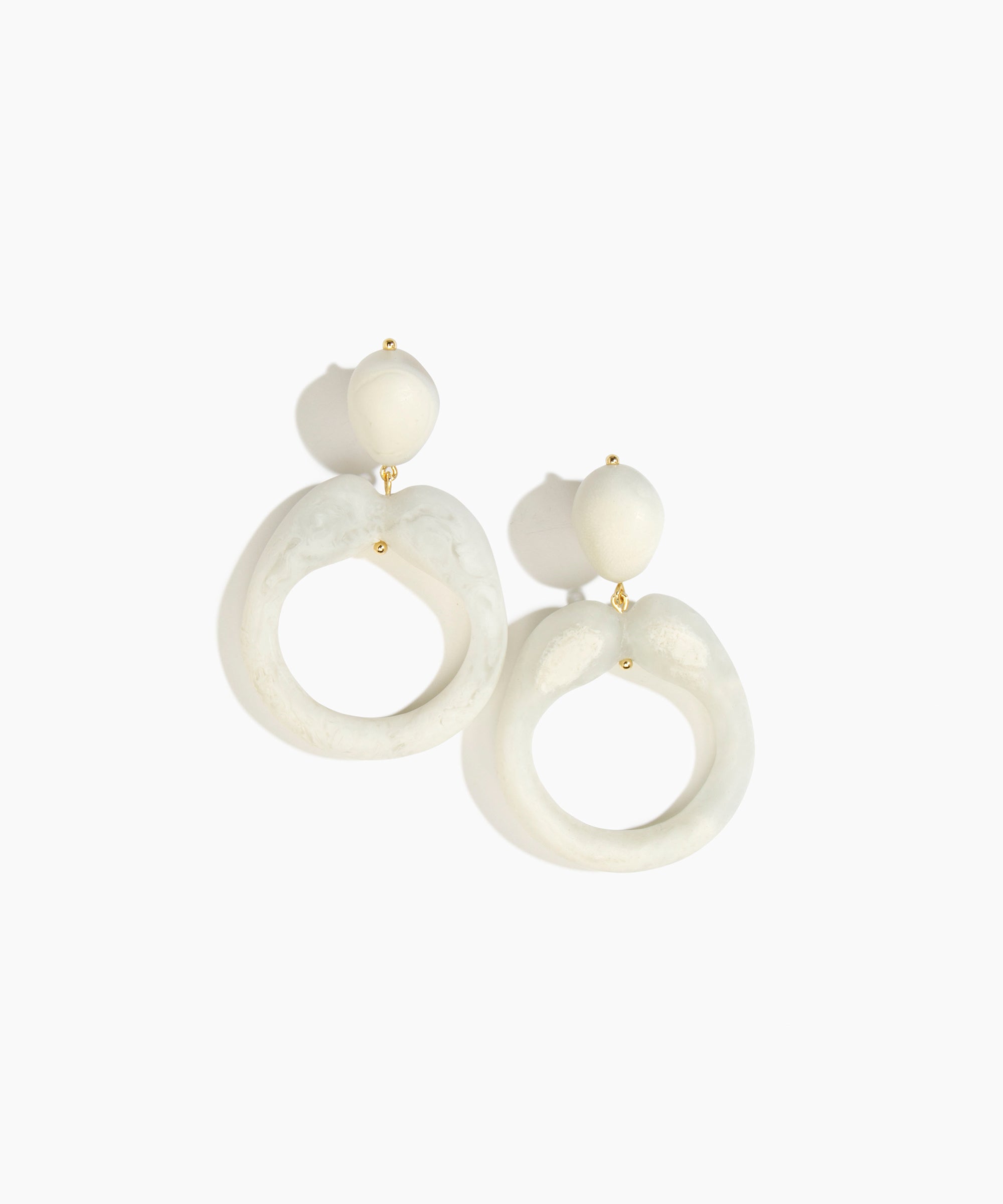 Dinosaur Designs Sprout Hoop Earrings in Chalk Swirl colour — marbled cream resin oversized irregular hoop drop earrings with small oval resin stud top and gold-plated hardware