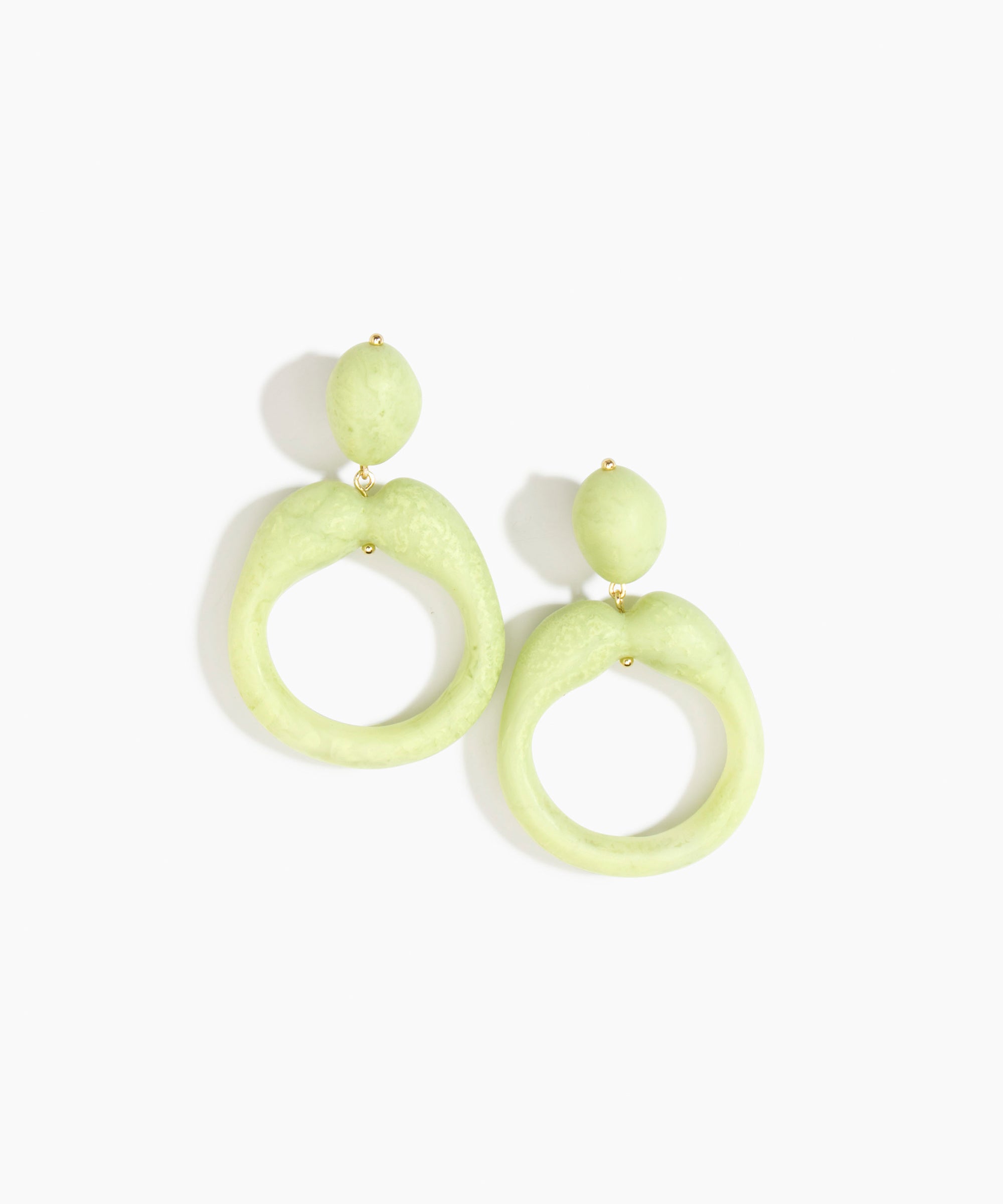 Dinosaur Designs Sprout Hoop Earrings in Pistachio colour — marbled pastel green resin oversized irregular hoop drop earrings with small oval resin stud top and gold-plated hardware