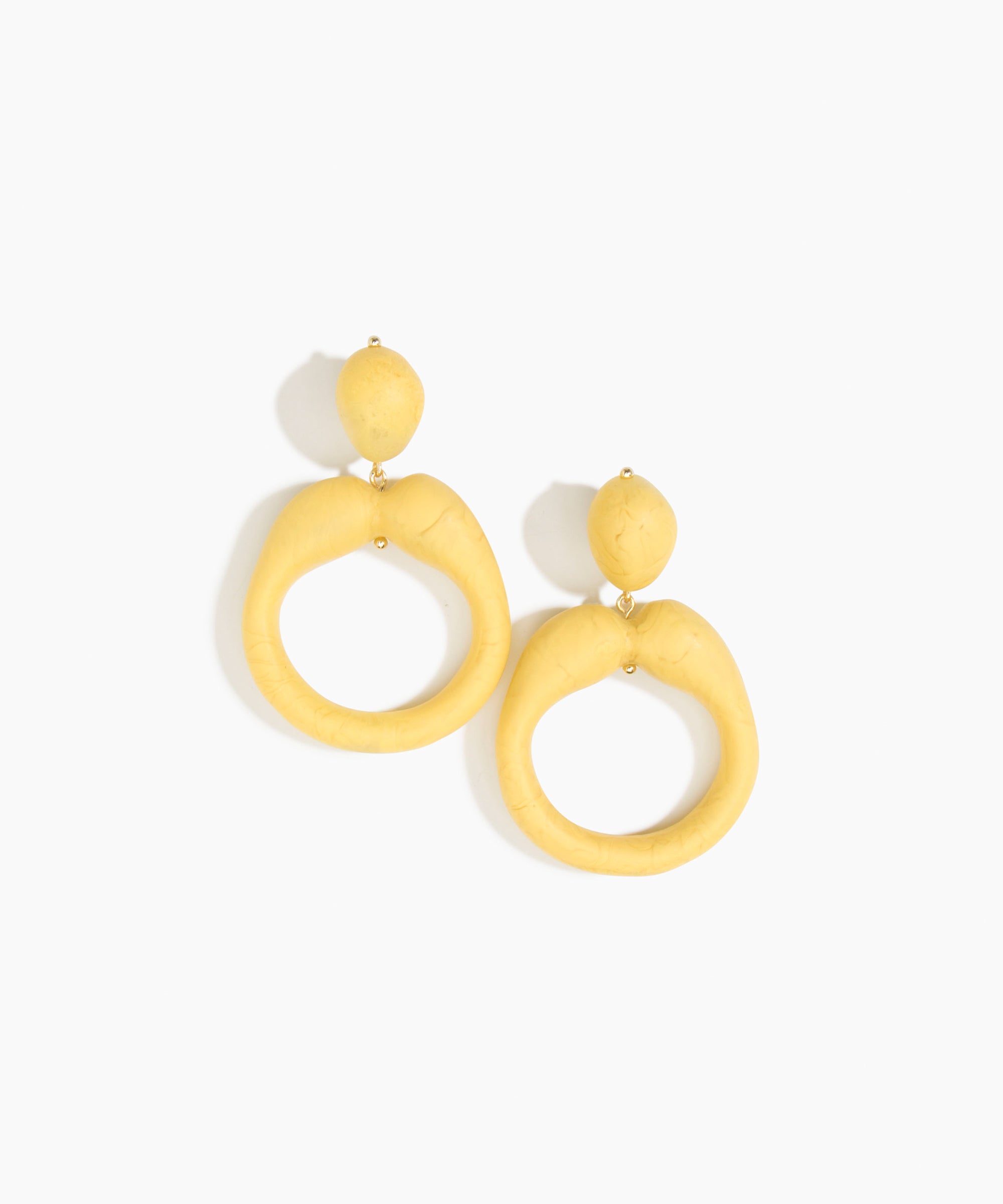 Dinosaur Designs Sprout Hoop Earrings in Pollen colour — marbled yellow resin oversized irregular hoop drop earrings with small oval resin stud top and gold-plated hardware