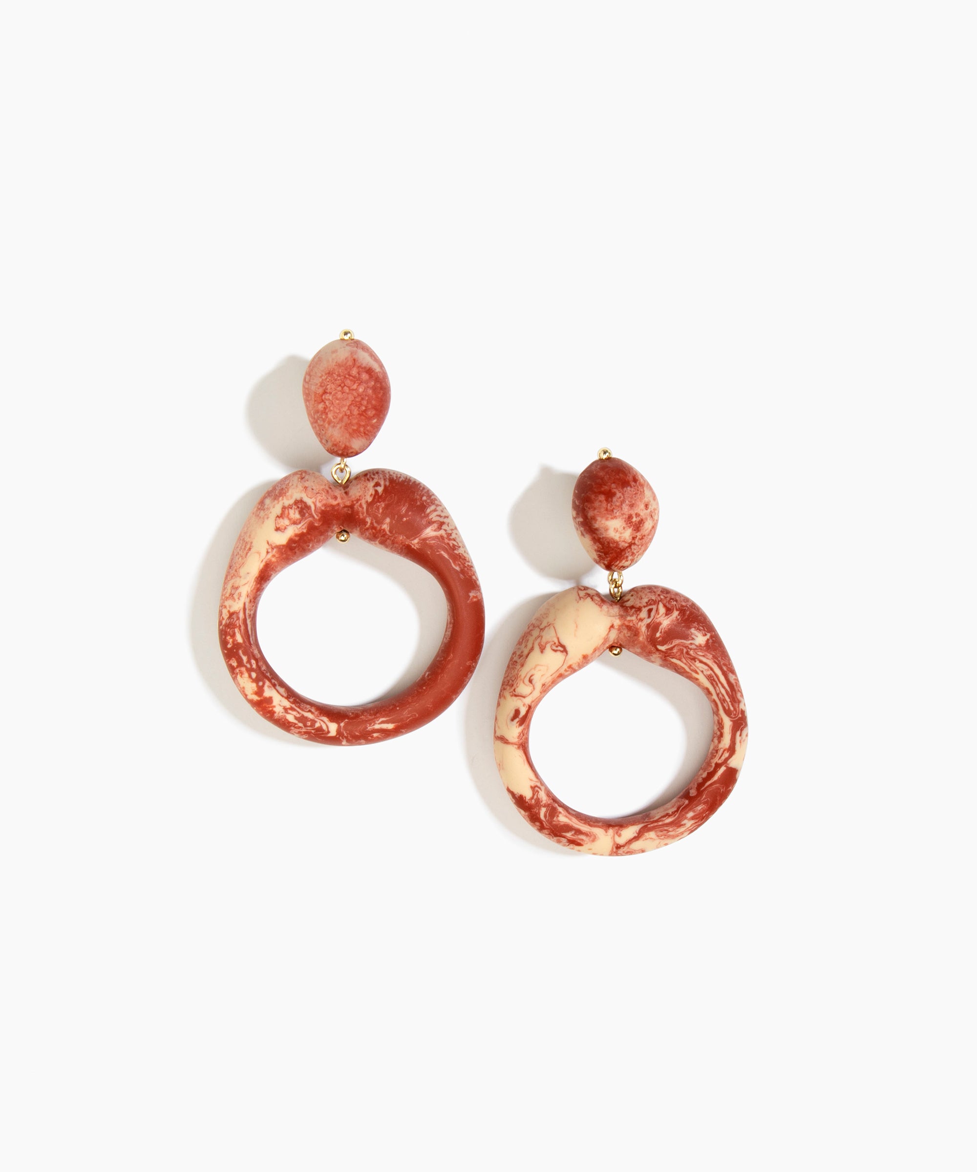Dinosaur Designs Sprout Hoop Earrings in Rust colour — marbled brown-red and cream resin oversized irregular hoop drop earrings with small oval resin stud top and gold-plated hardware