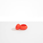 Dinosaur Designs JARPEBMED Medium Pebble Jar in Lychee orange color resin