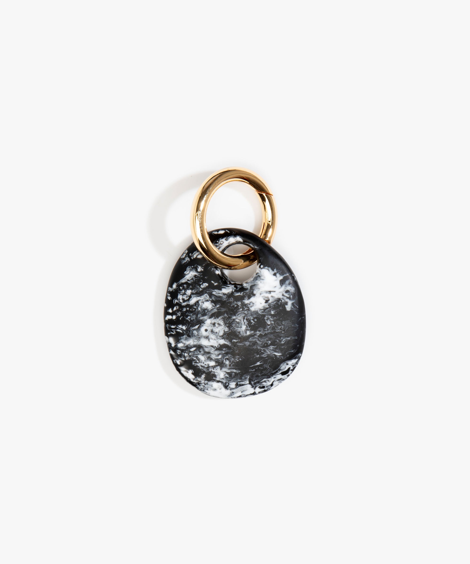 Dinosaur Designs Earth Keyring in Black Marble — handcrafted marbled Black and white resin pebble bead on a polished brass jump ring..