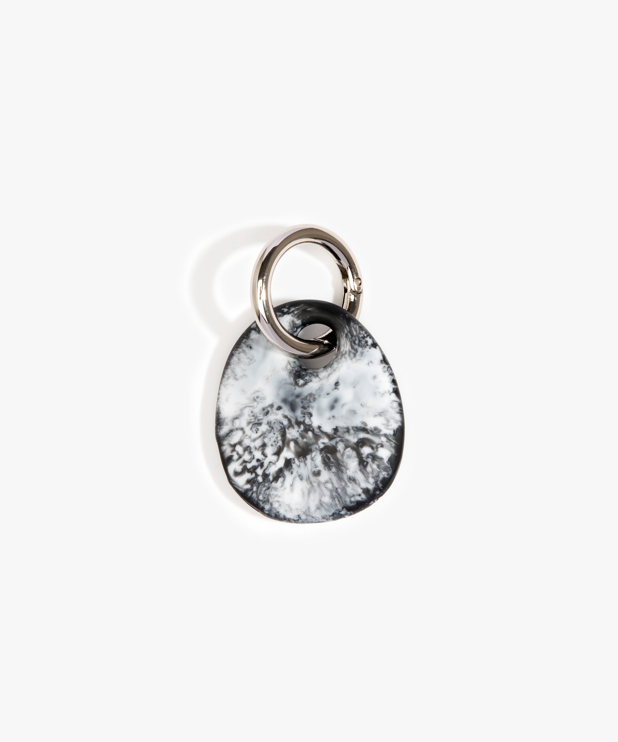 Dinosaur Designs Earth Keyring in Black Marble — handcrafted marbled Black and white resin pebble bead on a polished gunmetal jump ring..