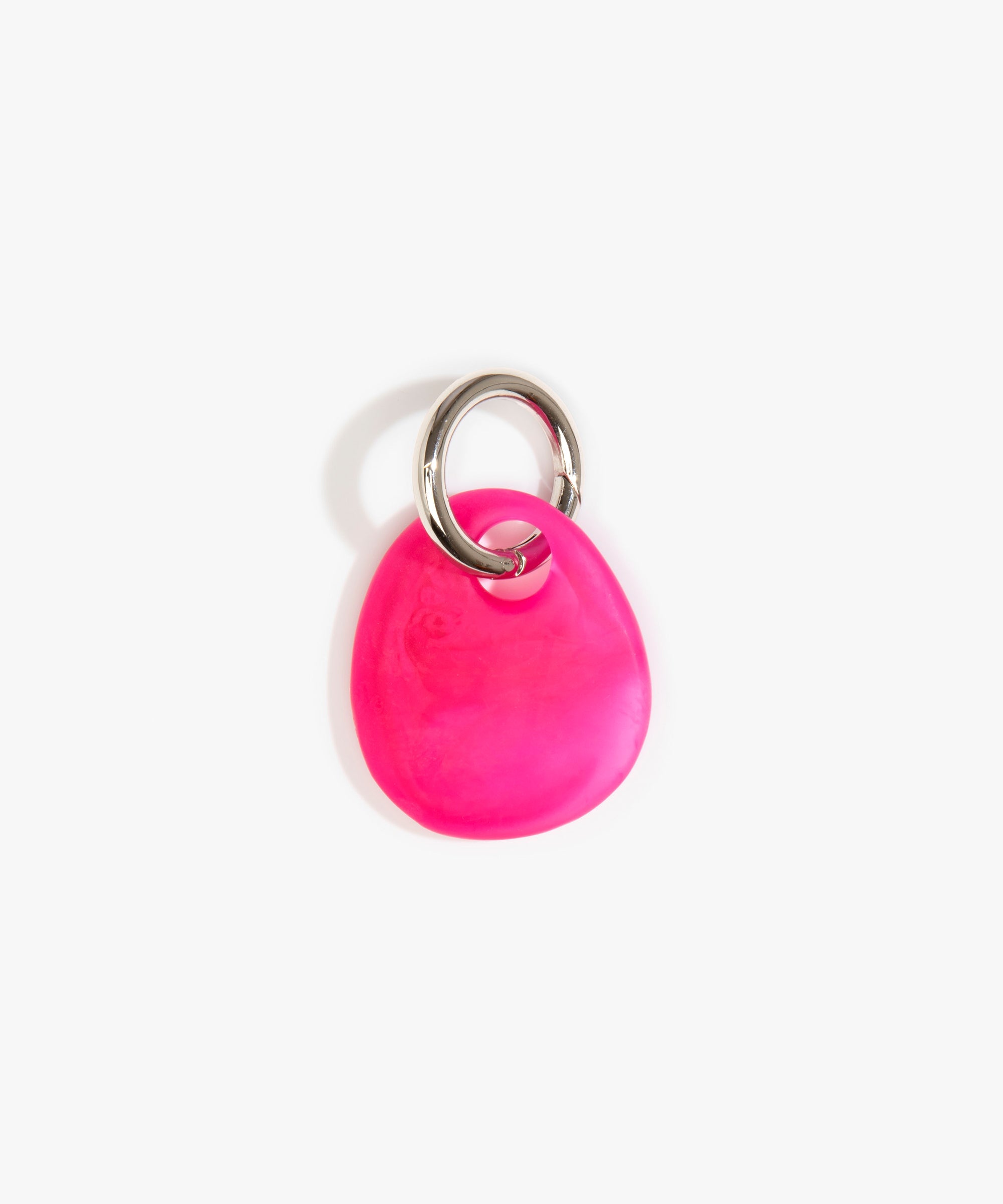 Dinosaur Designs Earth Keyring in Flamingo — handcrafted marbled fuschia pink resin pebble bead on a polished gunmetal jump ring..