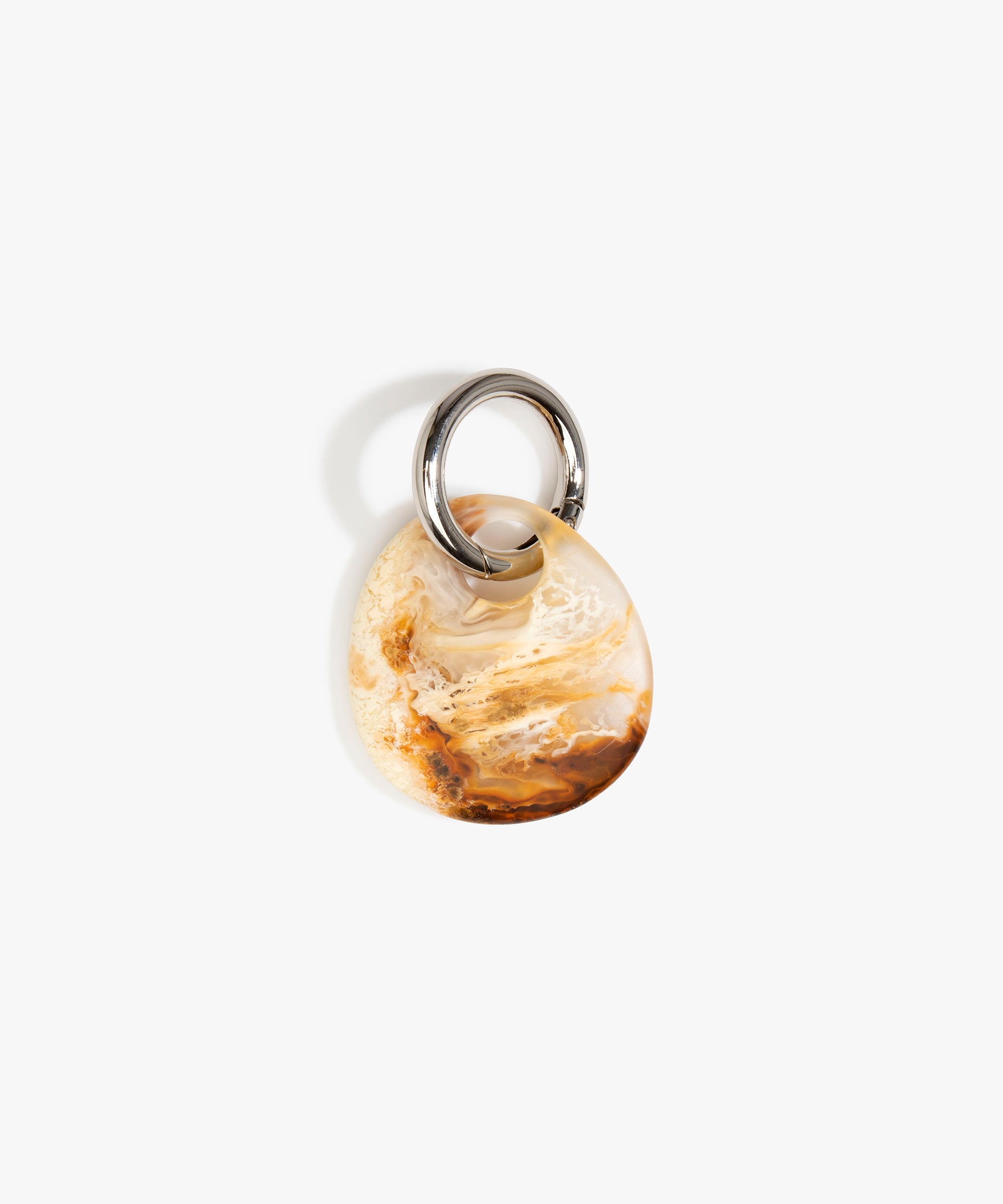 Dinosaur Designs Earth Keyring in Light Horn — handcrafted marbled brown, Cream and clear resin pebble bead on a polished gunmetal jump ring..