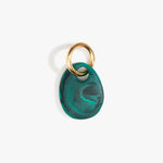Dinosaur Designs Earth Keyring in Mineral Swirl — handcrafted marbled teal green resin pebble bead on a polished brass jump ring..