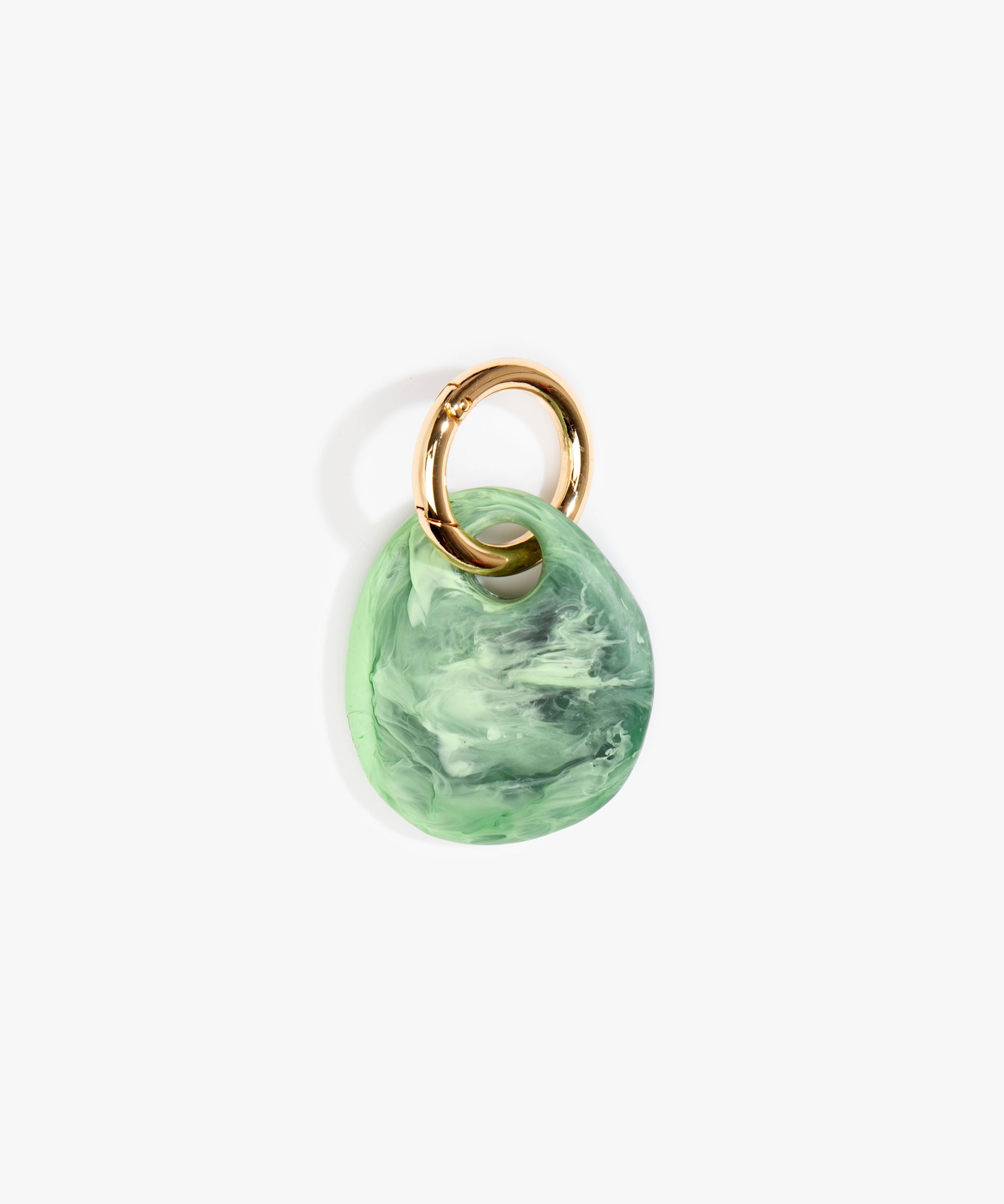 Dinosaur Designs Earth Keyring in Moss — handcrafted marbled green resin pebble bead on a polished brass jump ring..