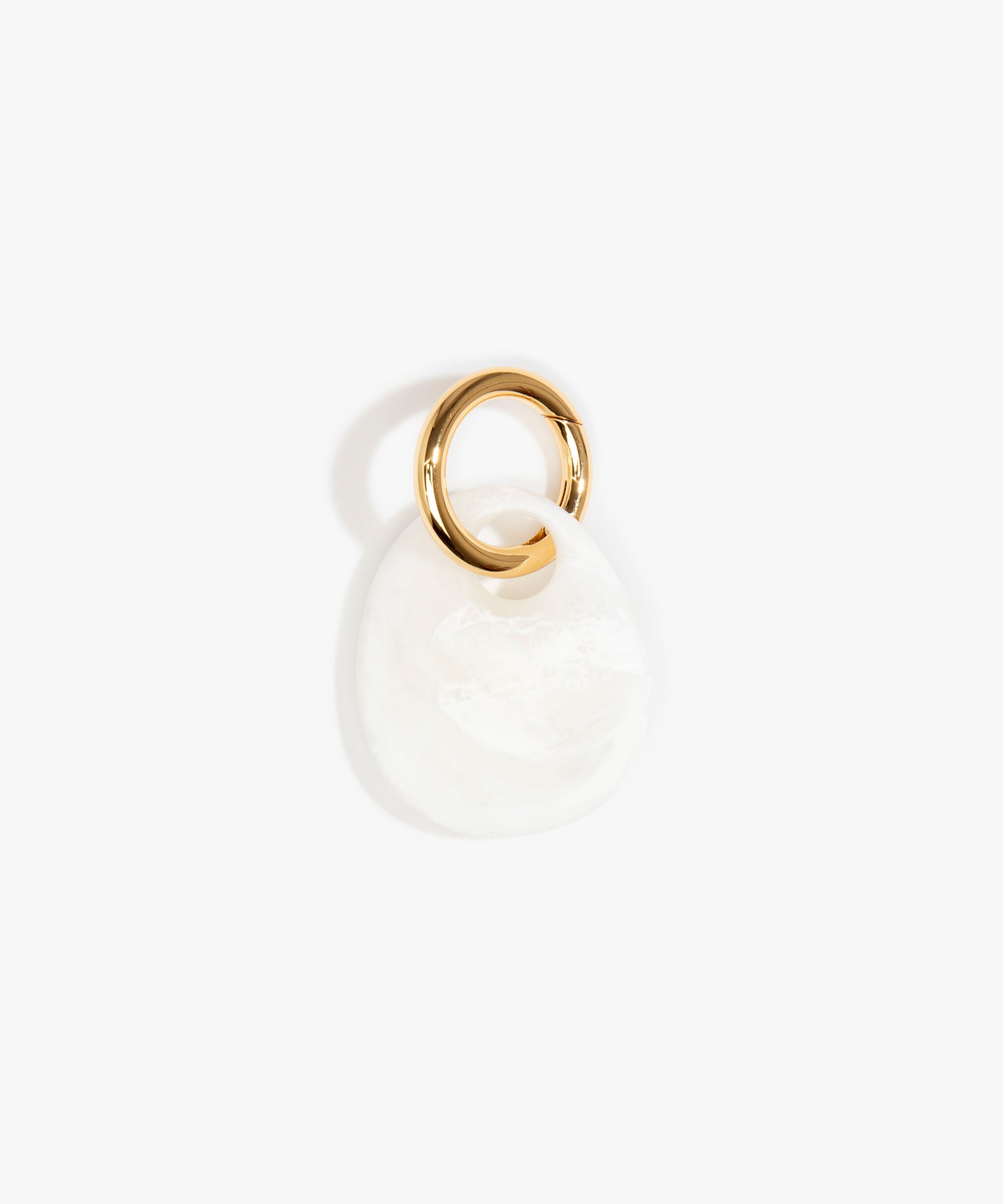 Dinosaur Designs Earth Keyring in Snow Swirl — handcrafted marbled white and clear resin pebble bead on a polished brass jump ring