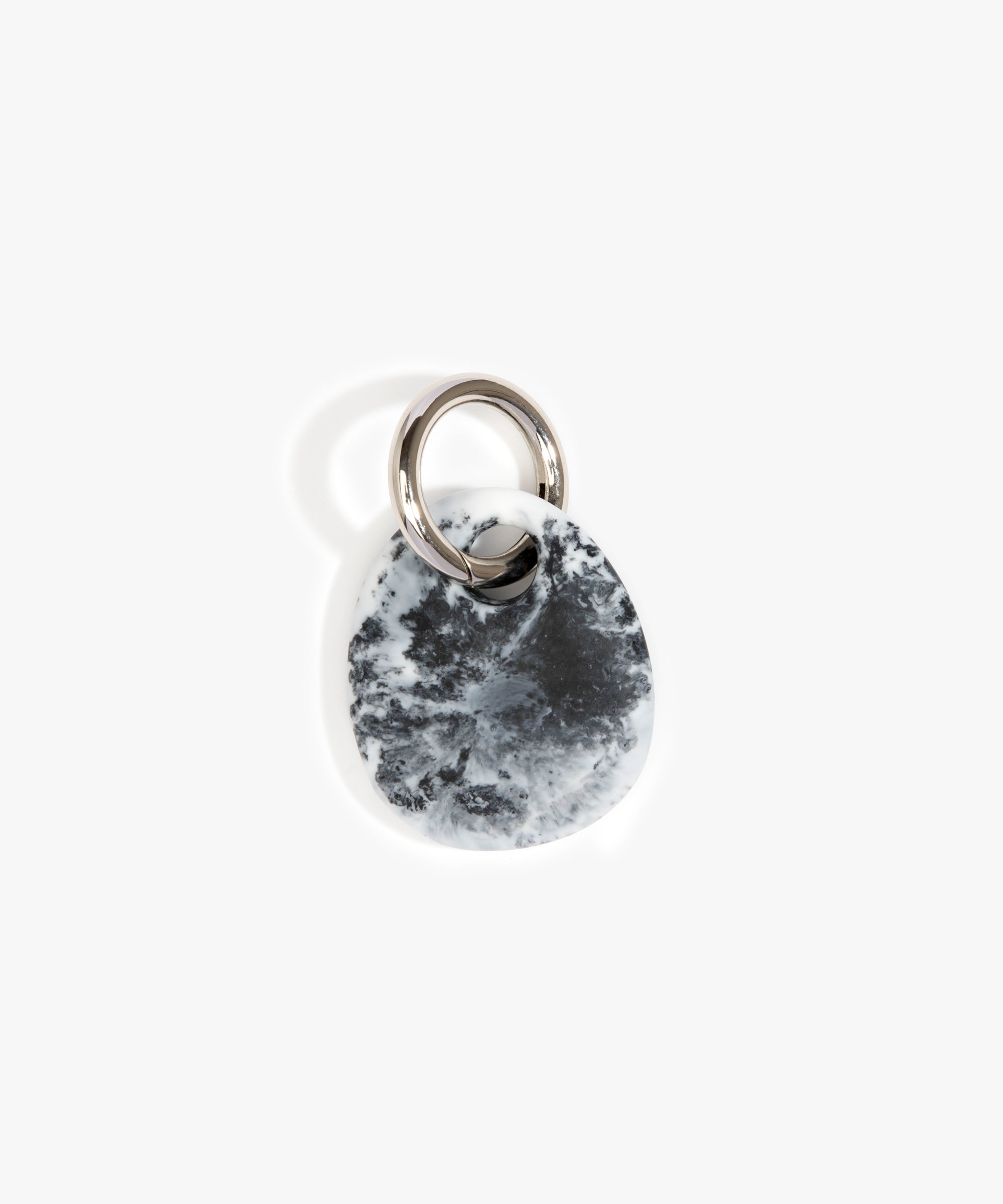 Dinosaur Designs Earth Keyring in White Marble — handcrafted marbled white and Black resin pebble bead on a polished gunmetal jump ring
