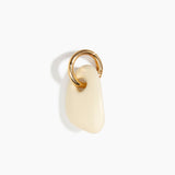 Dinosaur Designs Rock Keyring in Cream — handcrafted cream resin pebble bead on a polished brass jump ring