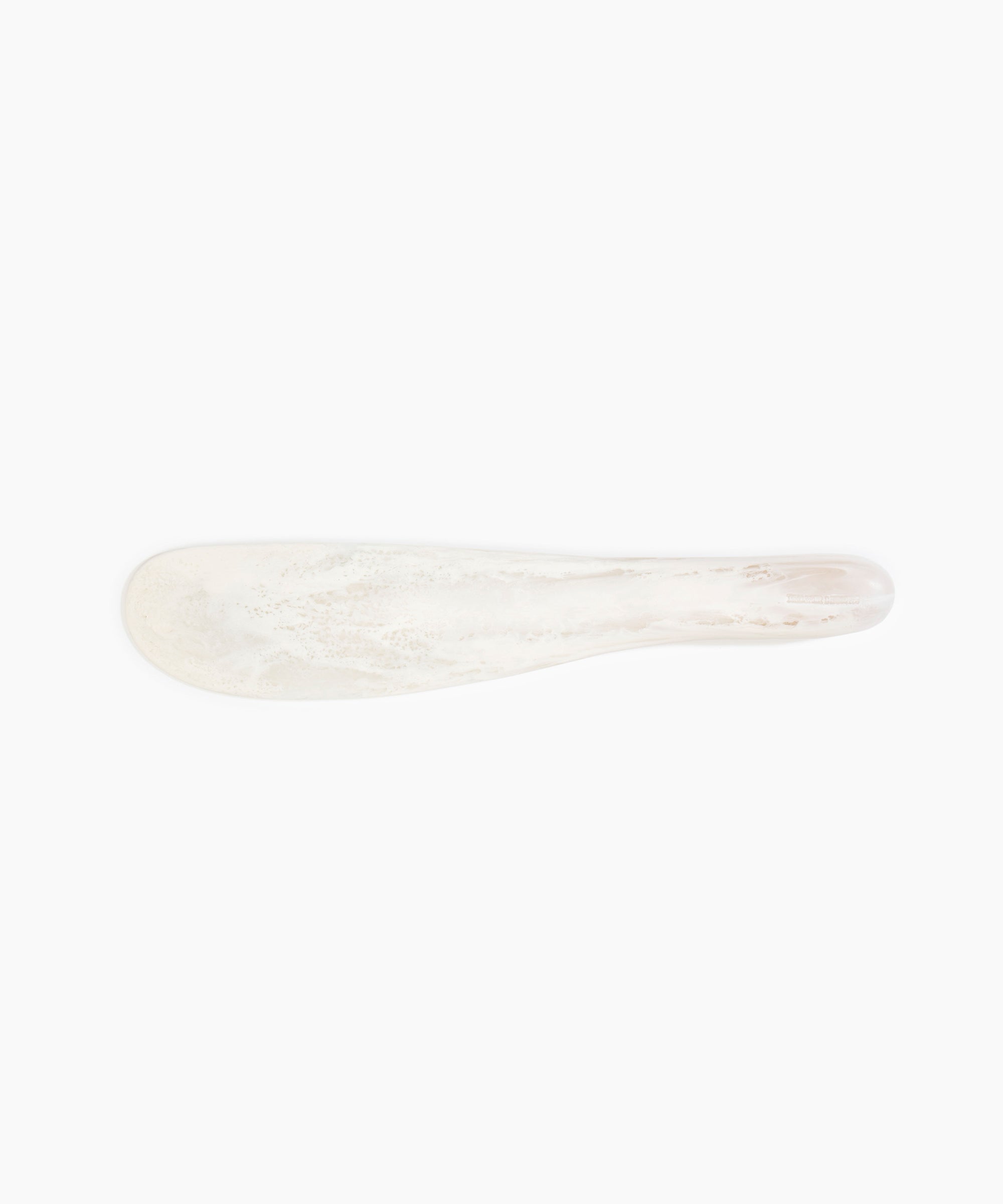 Dinosaur Designs Temple Cake Knife in Chalk Swirl — handcrafted marbled off white resin cake knife with smooth tapered blade and rounded handle.