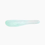 Dinosaur Designs Temple Cake Knife in Mint — handcrafted marbled green blue resin cake knife with smooth tapered blade and rounded handle.