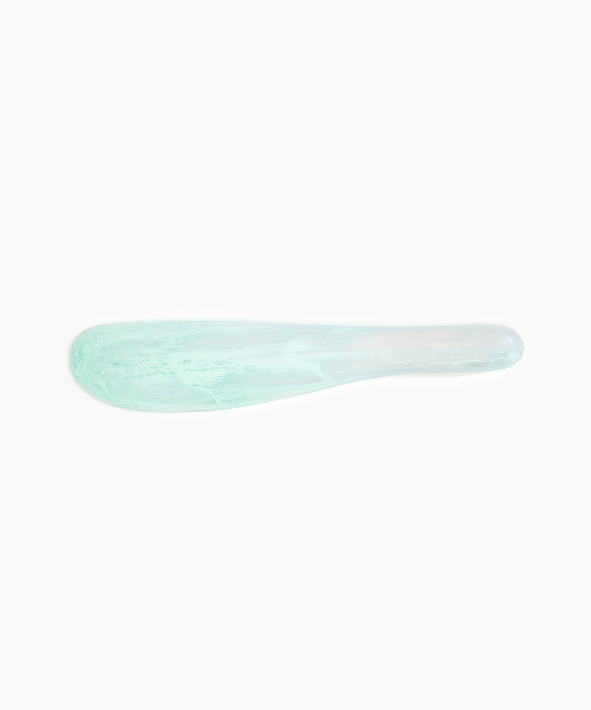 Dinosaur Designs Temple Cake Knife in Mint — handcrafted marbled green blue resin cake knife with smooth tapered blade and rounded handle.