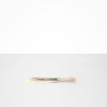 Dinosaur Designs Temple Cake Knife in Sandy Pearl — handcrafted marbled beige, grey and pearlescent resin cake knife with smooth tapered blade and rounded handle.