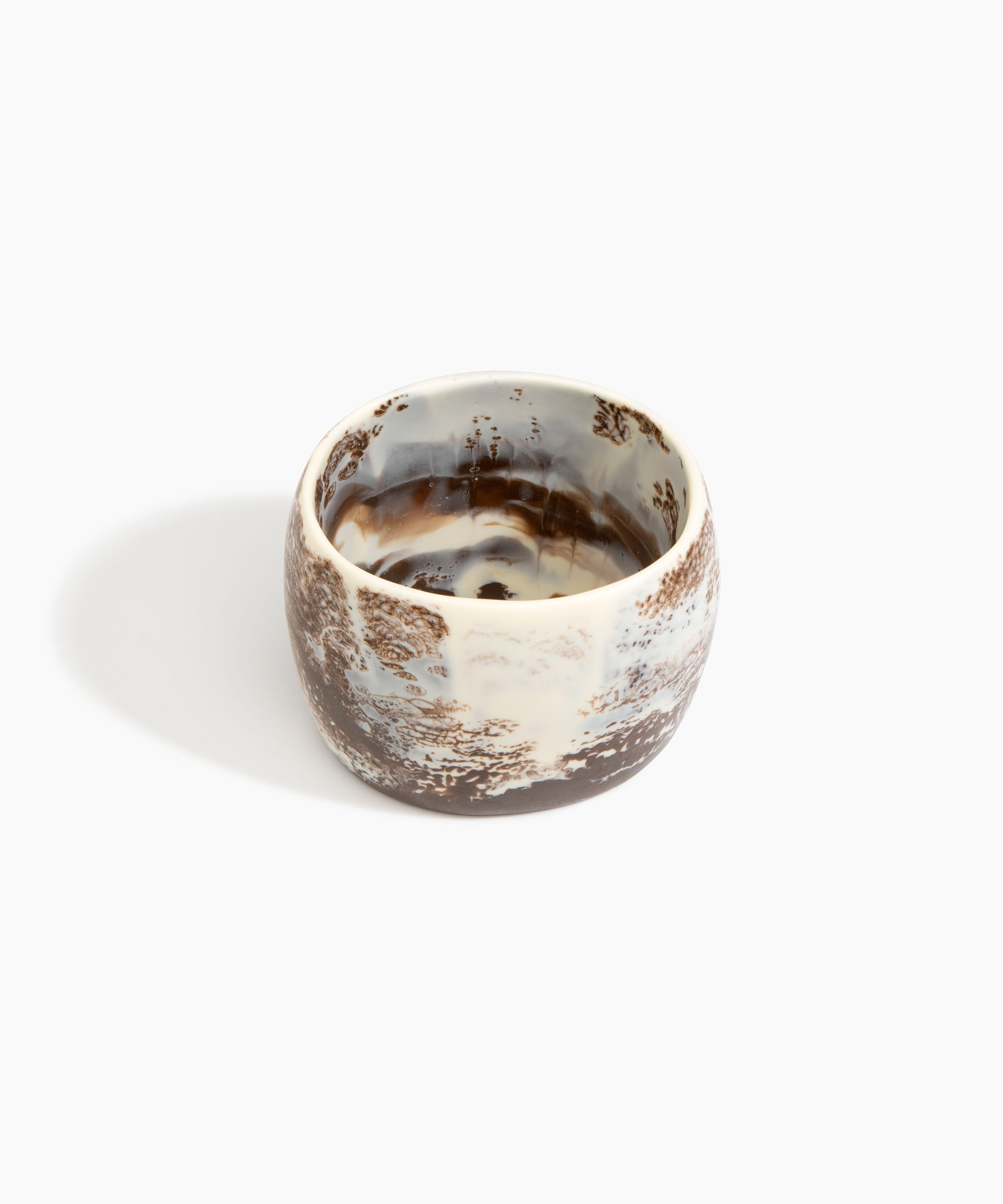 Dinosaur Designs Rock Totem Vase in Cappuccino — handcrafted pink marbled resin vase with organic silhouette.