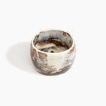 Dinosaur Designs Rock Totem Vase in Cappuccino — handcrafted pink marbled resin vase with organic silhouette.