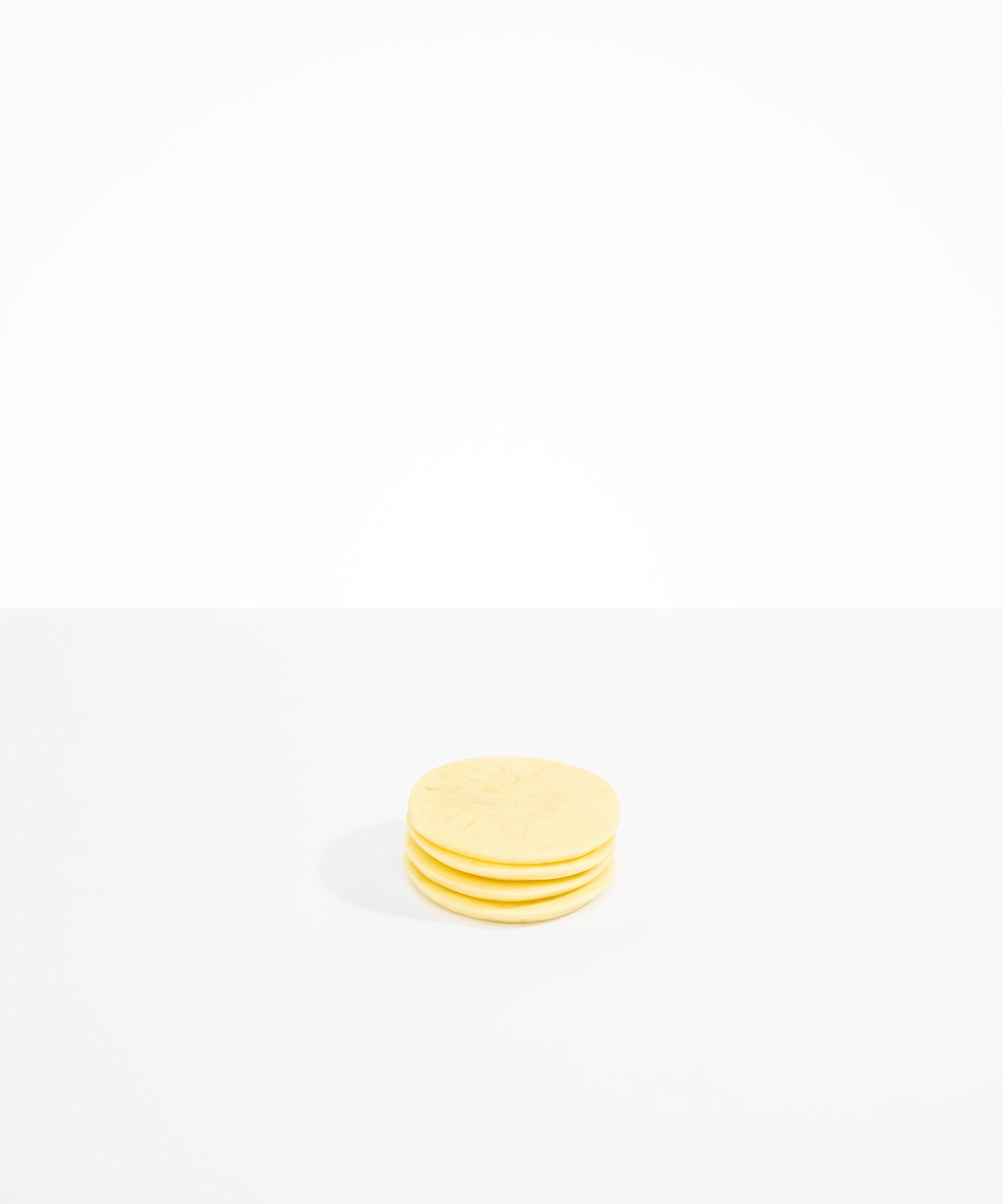 Dinosaur Designs Boulder Coaster Coasters in Lemon Colour resin..