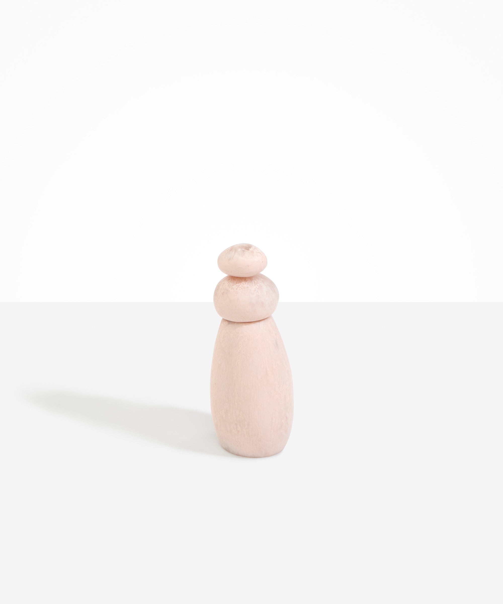 Dinosaur Designs Tall Pepper Boulder Grinder in Rose Swirl — handcrafted marbled dusty pink resin pepper grinder with elongated teardrop body and stacked pebble lid