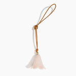 Dinosaur Designs Flower Bag Charm in Rose Swirl colour with Brass bead — handcrafted marbled dusty pink resin bell-shaped flower bag charm with tan leather hanging loop and brass bead