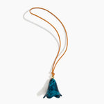 Dinosaur Designs Flower Bag Charm in Turquoise colour with Brass bead — handcrafted marbled teal blue resin bell-shaped flower bag charm with tan leather hanging loop and brass bead