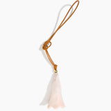 Dinosaur Designs Long Flower Bag Charm in Rose Swirl colour with Brass bead — handcrafted marbled dusty pink resin bell-shaped flower bag charm with tan leather hanging loop and brass bead