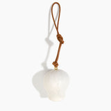 Dinosaur Designs Gumnut Decoration in Chalk Swirl colour with Brass hardware — handcrafted marbled off-white resin gumnut-shaped ornament with tan leather hanging loop and brass bead