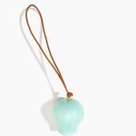 Dinosaur Designs Gumnut Decoration in Mint colour with Brass hardware — handcrafted marbled mint blue resin gumnut-shaped ornament with tan leather hanging loop and brass bead