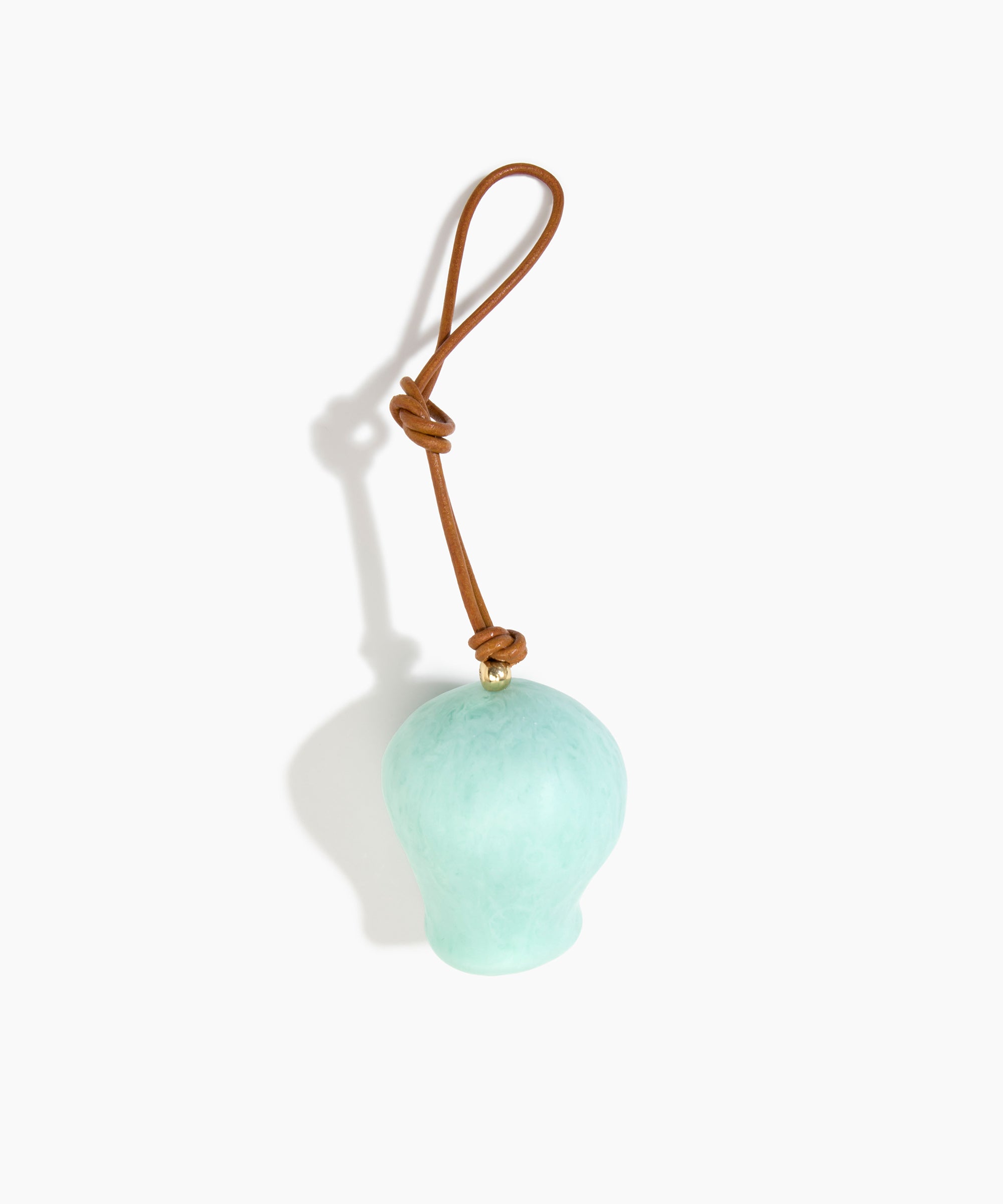 Dinosaur Designs Gumnut Decoration in Mint colour with Brass hardware — handcrafted marbled mint blue resin gumnut-shaped ornament with tan leather hanging loop and brass bead