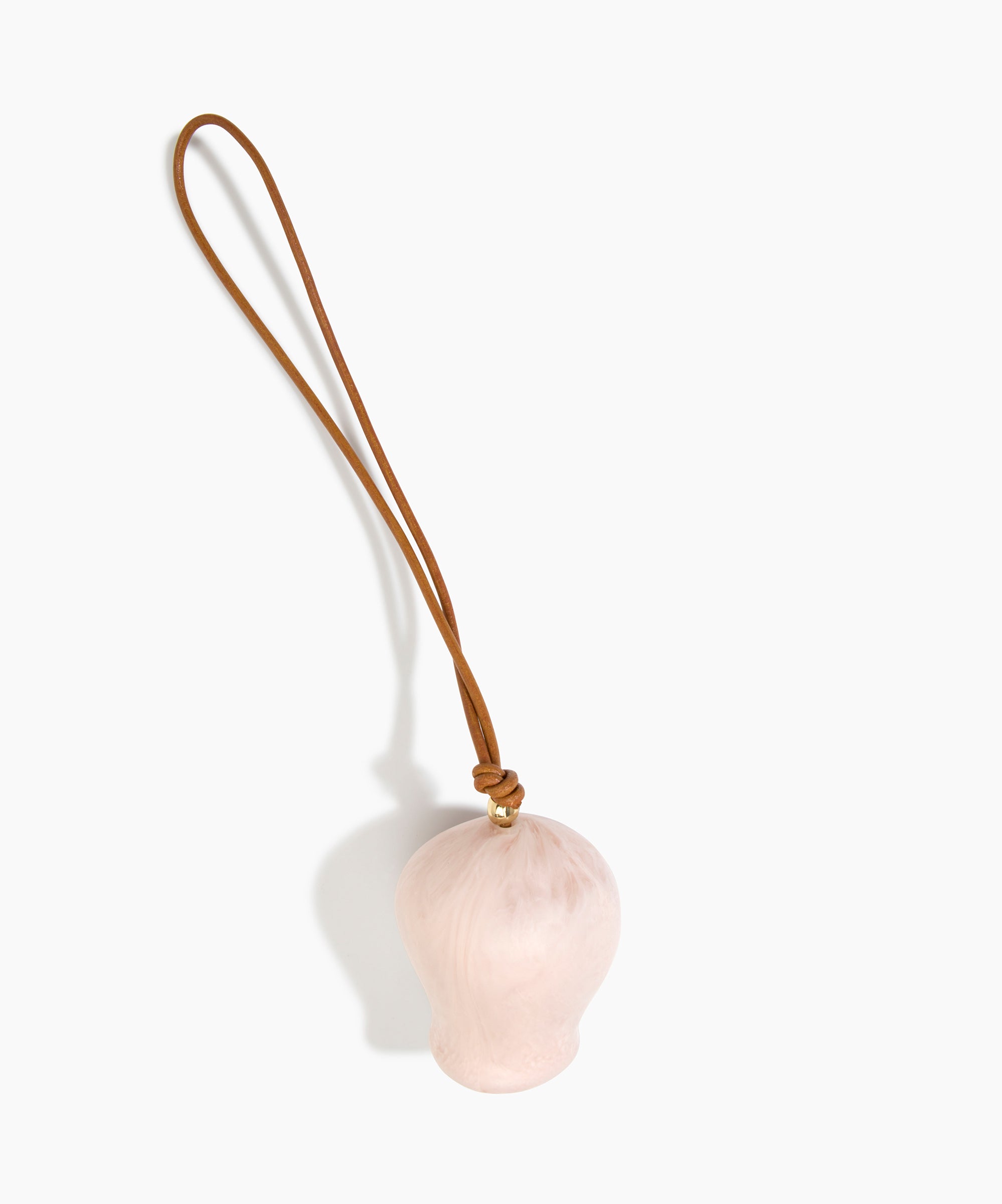 Dinosaur Designs Gumnut Decoration in Rose Swirl colour with Brass hardware — handcrafted marbled dusty pink resin gumnut-shaped ornament with tan leather hanging loop and brass bead