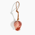 Dinosaur Designs Gumnut Decoration in Rust colour with Brass hardware — handcrafted marbled terracotta red and cream resin gumnut-shaped ornament with tan leather hanging loop and brass bead