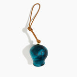 Dinosaur Designs Gumnut Decoration in Turquoise colour with Brass hardware — handcrafted marbled teal blue resin gumnut-shaped ornament with tan leather hanging loop and brass bead