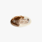 Dinosaur Designs Rock Plate in Cappuccino — handcrafted marbled brown and cream resin oval flat serving plate with rounded organic edge..