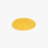 Dinosaur Designs Rock Plate in Pollen — handcrafted marbled yellow resin oval flat serving plate with rounded organic edge