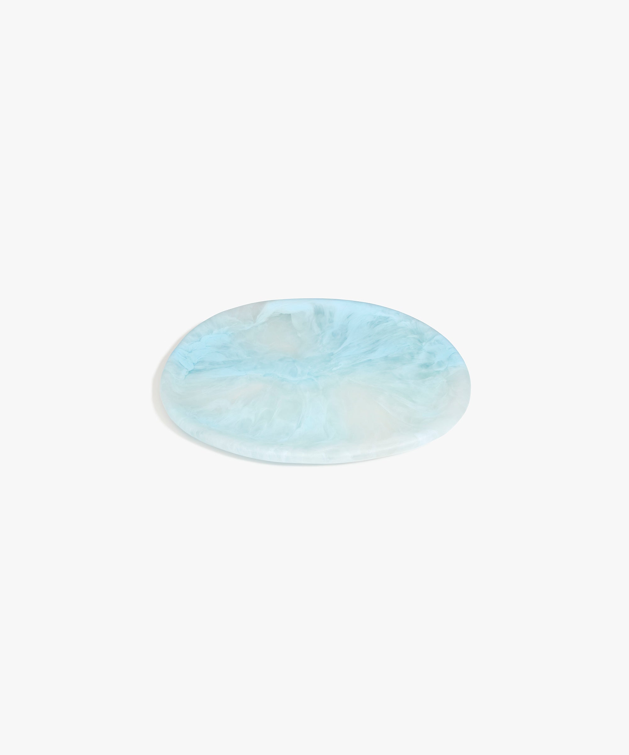Dinosaur Designs Rock Plate in Pool — handcrafted marbled blue resin oval flat serving plate with rounded organic edge
