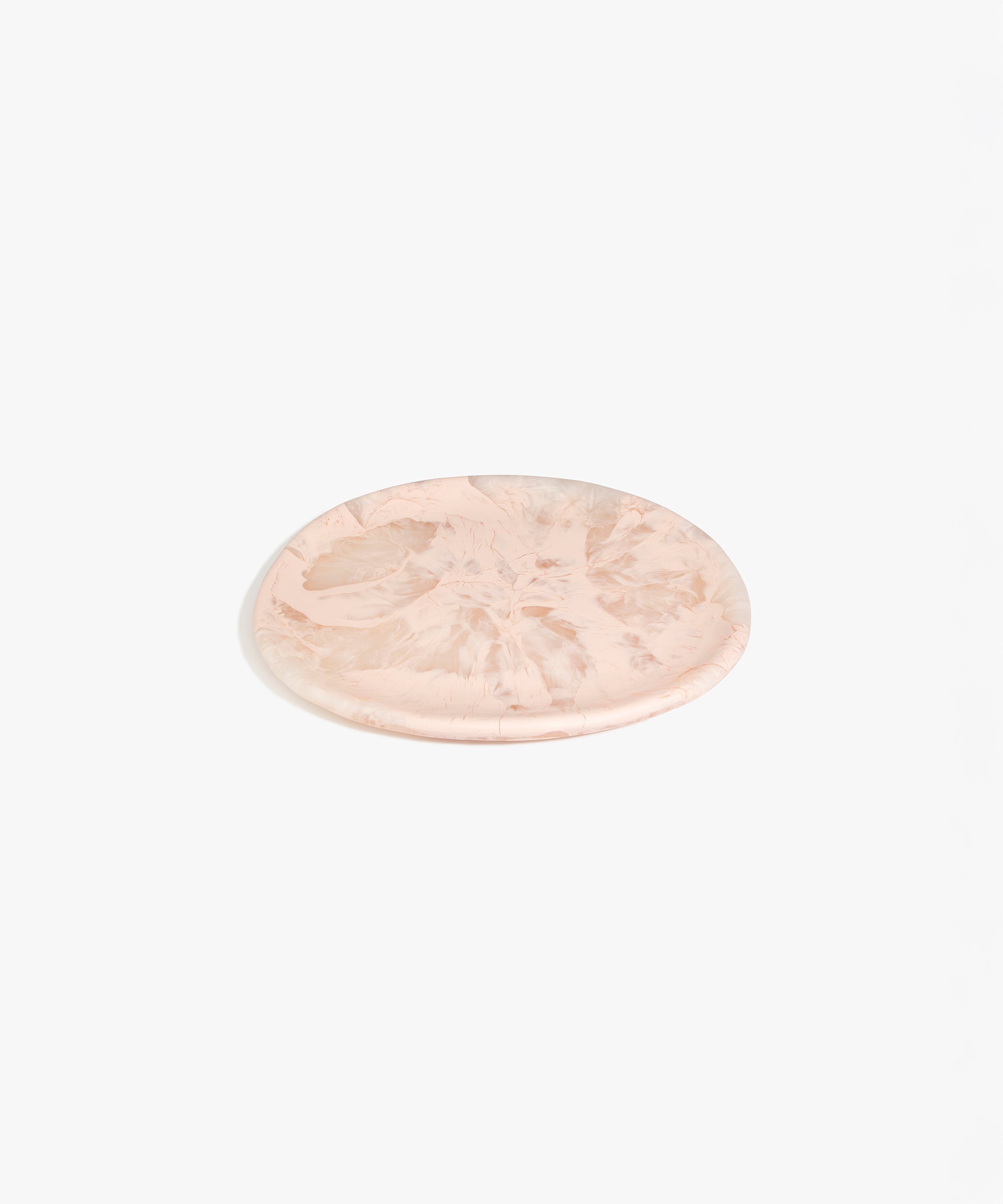 Dinosaur Designs Rock Plate in Rose Swirl — handcrafted marbled dusty pink resin oval flat serving plate with rounded organic edge