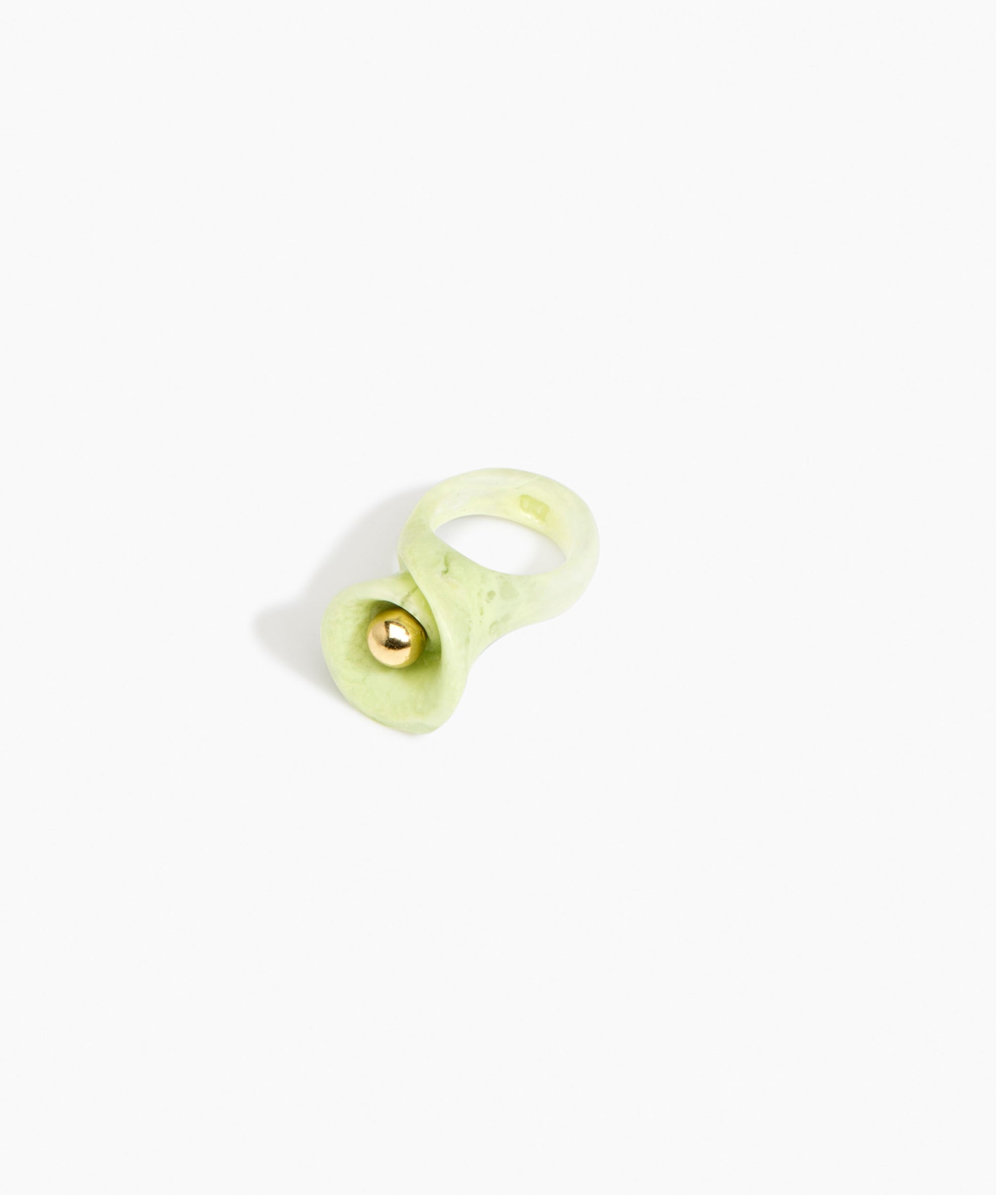 Dinosaur Designs Long Lily Ring in Pistachio — handcrafted marbled pastel green resin ring with sculptural swirled flower and brass bead