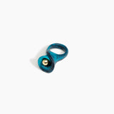Dinosaur Designs Long Lily Ring in Turquoise — handcrafted marbled teal blue resin ring with sculptural swirled flower and brass bead