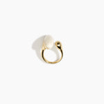 Dinosaur Designs Polished Lotus Ring in Chalk Swirl with Brass — marbled off-white resin elongated oval ring with  brass band and small brass ball detail
