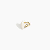 Dinosaur Designs Polished Lotus Ring in Chalk Swirl with Brass — marbled off-white resin elongated oval ring with  brass band and small brass ball detail