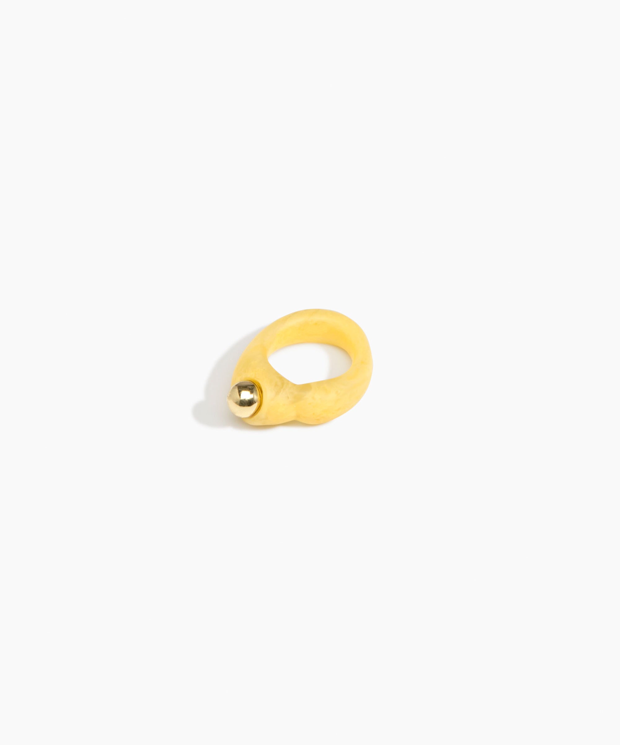 Dinosaur Designs Sprout Dot Ring in Pollen with Brass — handcrafted marbled yellow resin organic band ring with polished brass bead