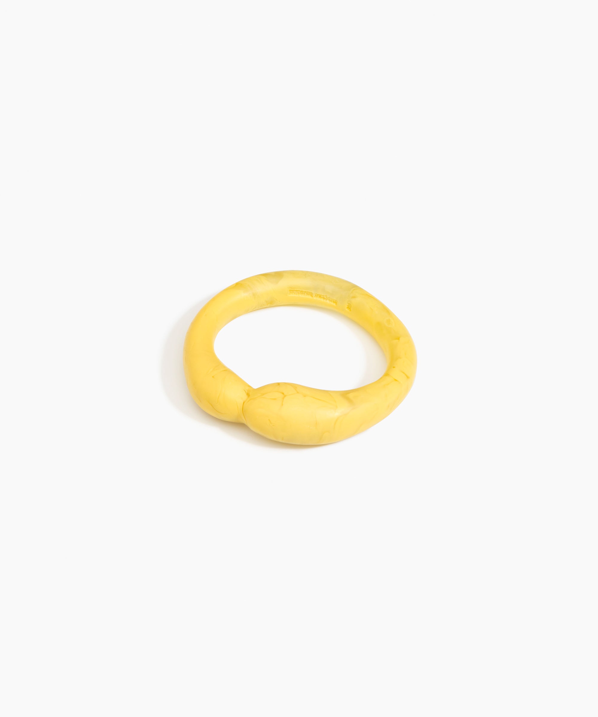 Dinosaur Designs Sprout Bangle in Pollen — handcrafted marbled yellow resin bangle with chunky rounded form