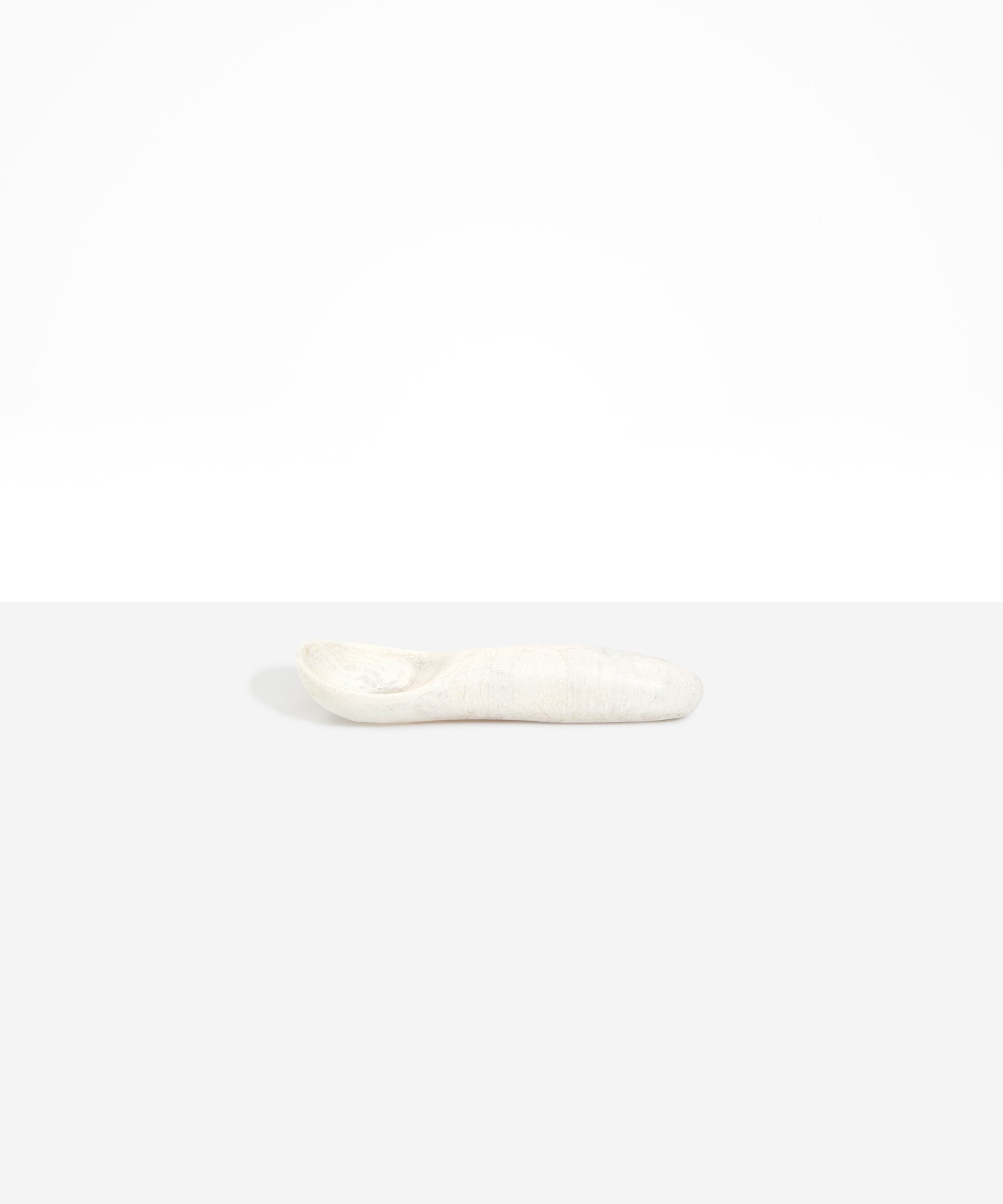 Dinosaur Designs Shell Gelato Scoop in Chalk Swirl — handcrafted marbled off-white resin ice cream scoop with deep rounded bowl and smooth cylindrical handle