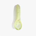 Dinosaur Designs Shell Gelato Scoop in Pistachio — handcrafted marbled pale green resin ice cream scoop with deep rounded bowl and smooth cylindrical handle