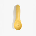 Dinosaur Designs Shell Gelato Scoop in Pollen — handcrafted marbled yellow resin ice cream scoop with deep rounded bowl and smooth cylindrical handle
