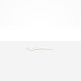 Dinosaur Designs Large Shell Spoon in Chalk Swirl — handcrafted marbled off-white resin spoon with slender tapered handle