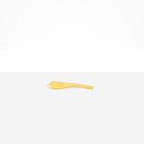 Dinosaur Designs Large Shell Spoon in Pollen — handcrafted marbled yellow resin spoon with slender tapered handle