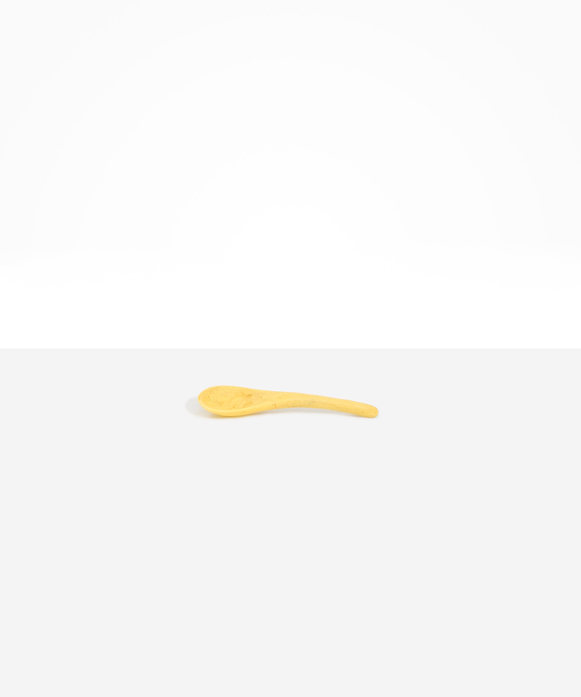 Dinosaur Designs Large Shell Spoon in Pollen — handcrafted marbled yellow resin spoon with slender tapered handle