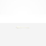 Dinosaur Designs Medium Shell Spoon in Chalk Swirl — handcrafted marbled off-white resin spoon with slender tapered handle